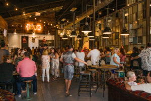 Wide Shot of Inside Braman Winery & Brewery with People